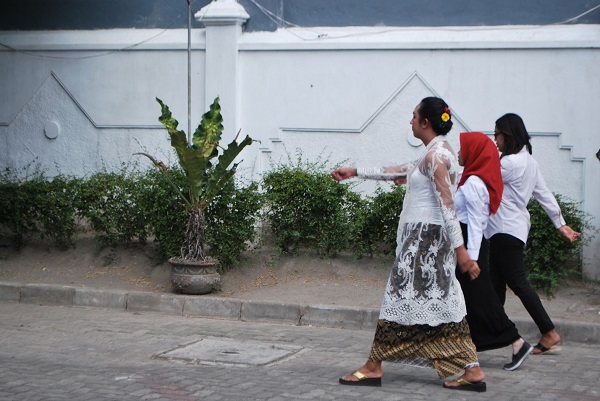 Diega Garcia Rodriguez/ The pengibar bendera (flag raisers) group after hoisting the flag